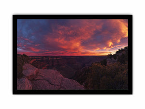 Dramatic red canyon sunset photography for bold modern office wall decor.