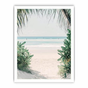 Tropical beach artwork with palm leaves for serene coastal bedroom decor