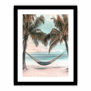 Hammock between palm trees overlooking ocean for peaceful coastal bedroom decor