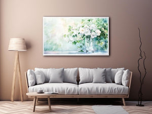 White floral watercolor canvas art in glass vase for soft living room decor.