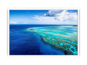 Aerial coral reef canvas photography for coastal living room styling.
