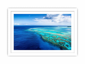 Aerial coral reef canvas photography for coastal living room styling.