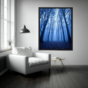 Moody blue forest trees canvas art for tall modern hallway decor.