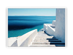 Mediterranean white stairs and turquoise sea canvas art for coastal living room decor.