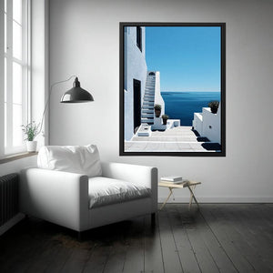 Greek courtyard stairs and sea photography for Mediterranean entryway decor.