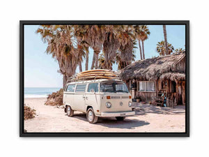Cream vintage surf van near a palm beach hut for rustic coastal living room decor.