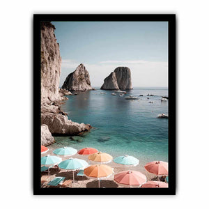 Pastel umbrellas overlooking turquoise sea cliffs for Mediterranean coastal bedroom decor.