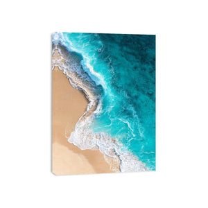 Turquoise aerial ocean wave canvas art for modern coastal living room wall decor.