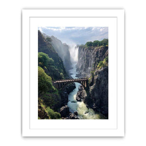 Vertical waterfall canyon photography print with bridge for dramatic entryway wall decor.