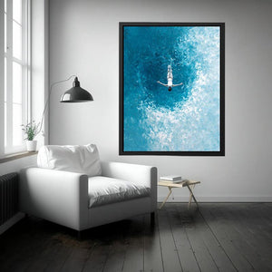 Turquoise ocean swimmer canvas art for coastal bathroom or living room decor.