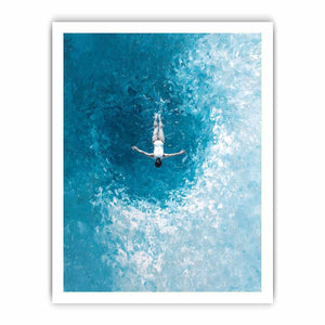 Turquoise ocean swimmer canvas art for coastal bathroom or living room decor.