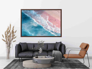 Aerial ocean canvas print with pink sand and turquoise waves for serene bedroom decor