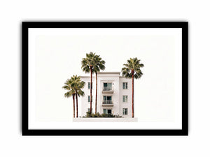 Palm building framed print with white architecture and tall trees for airy office decor