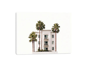 Palm building framed print with white architecture and tall trees for airy office decor