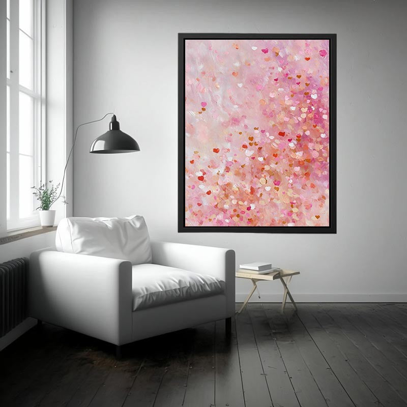 Soft pink abstract canvas art with heart-like confetti marks for bedroom or nursery decor.