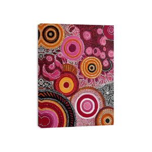 Ruby and ochre abstract dot canvas art with circular patterns for bold modern decor.