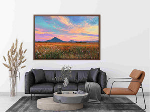 Pastel mountain landscape canvas art with meadow and sunset sky for modern living room decor.