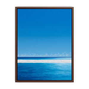 Bright turquoise ocean canvas art with white surf and blue sky for coastal bedroom decor.