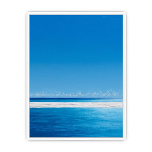 Bright turquoise ocean canvas art with white surf and blue sky for coastal bedroom decor.