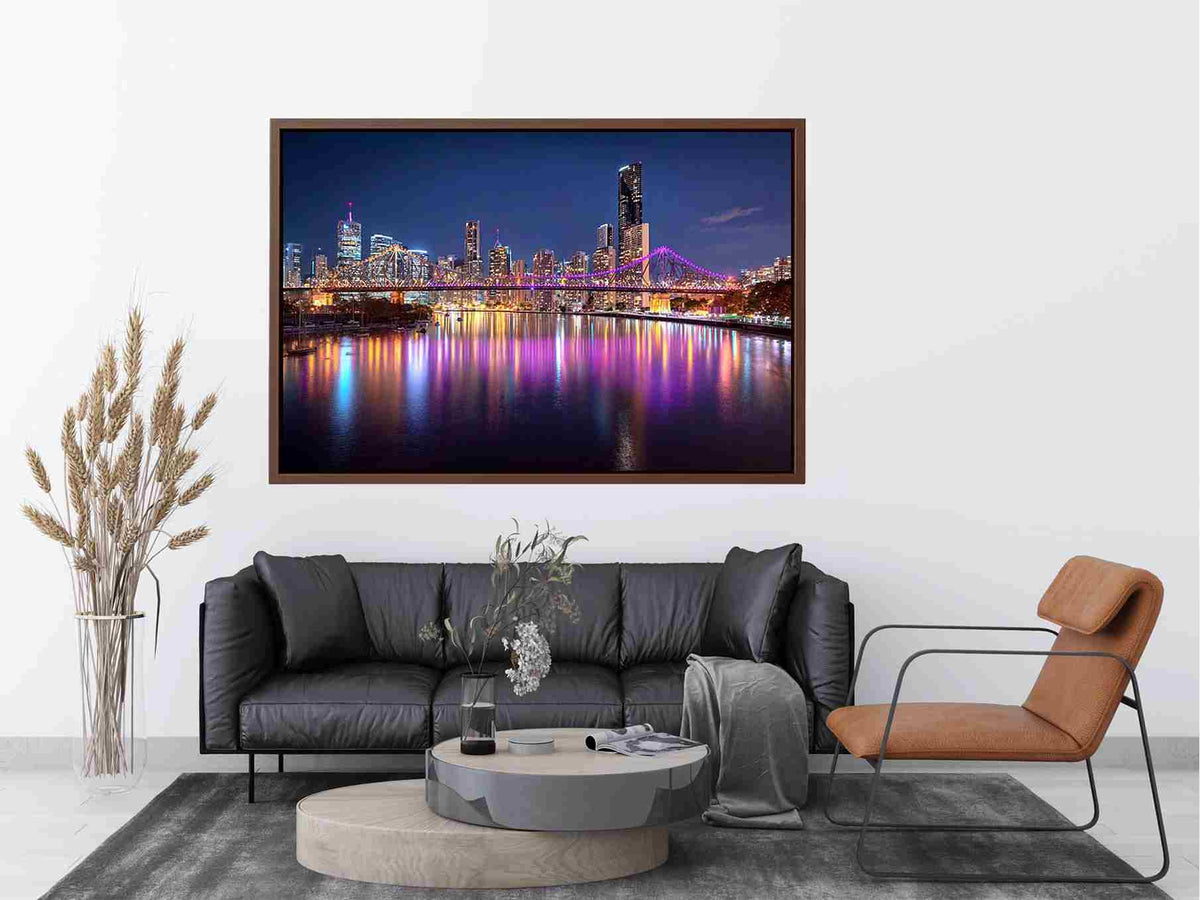 Illuminated bridge and city skyline canvas art for contemporary living room decor.
