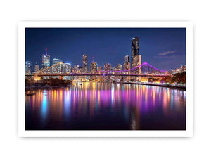 Illuminated bridge and city skyline canvas art for contemporary living room decor.