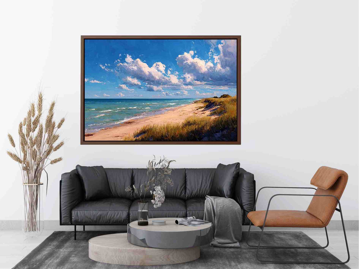 Coastal dune canvas art with beach grass and clouds for relaxed living room decor.