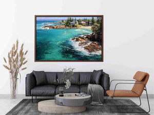 Turquoise coastal cove canvas art with rocky shoreline for modern living room decor.