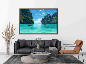 Turquoise tropical cove canvas art with boats and cliffs for bright coastal living room decor.