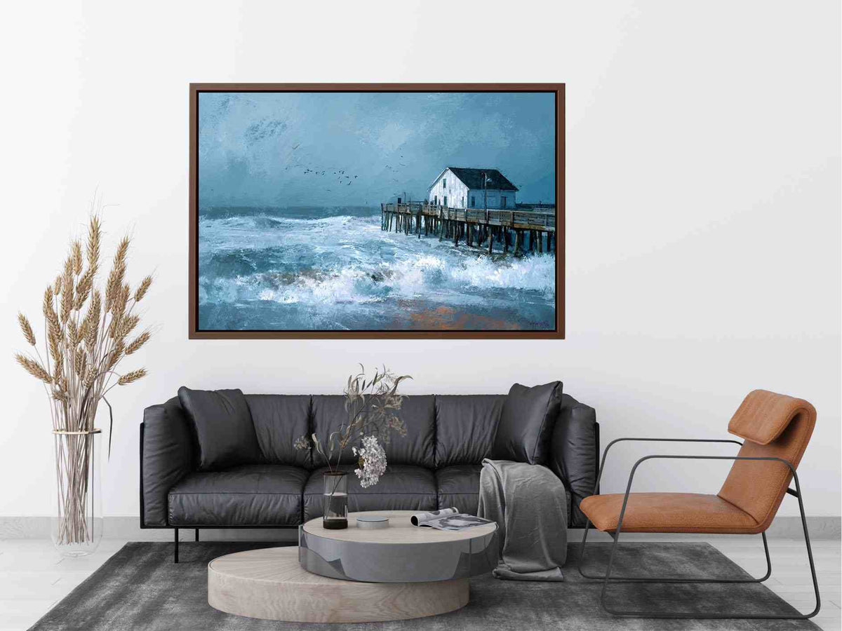 Moody coastal pier seascape canvas art with blue-gray waves for modern beach house decor.