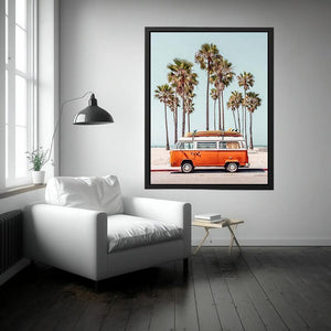 Vintage surf van with palm trees and beach atmosphere for coastal living room decor.