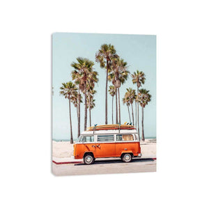 Vintage surf van with palm trees and beach atmosphere for coastal living room decor.