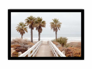 Coastal boardwalk and palm tree canvas art for serene beach house decor