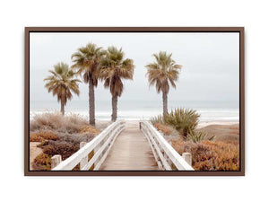 Coastal boardwalk and palm tree canvas art for serene beach house decor