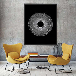 Black and white circular dot abstract canvas art for modern living room decor.