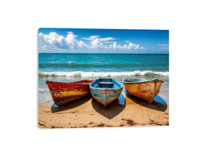 Colorful fishing boats resting on a sandy beach with turquoise ocean and clear sky