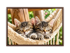 Bright cozy sleeping kitten wall art featuring two tabby cats resting in a woven hammock with soft natural daylight and neutral organic tones.