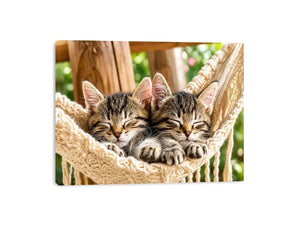 Bright cozy sleeping kitten wall art featuring two tabby cats resting in a woven hammock with soft natural daylight and neutral organic tones.
