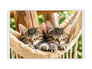 Bright cozy sleeping kitten wall art featuring two tabby cats resting in a woven hammock with soft natural daylight and neutral organic tones.