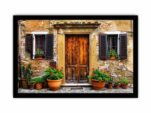 Bright rustic Mediterranean house facade wall art with vintage wooden doors, textured stone walls, and terracotta flower pots in airy natural daylight.