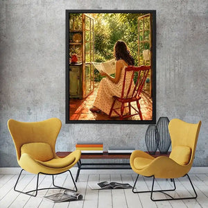Woman reading by open garden window in cozy cottage interior vintage inspired wall art canvas for elegant home decor