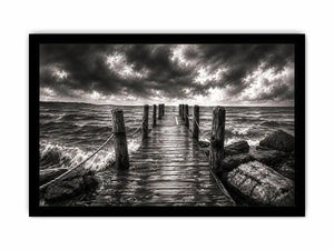Black and white ocean pier wall art with dramatic coastal waves and minimalist nautical landscape aesthetic