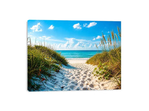 Coastal beach path wall art with sandy dunes leading to blue ocean under clear sky, serene seaside canvas for living room and beach house decor
