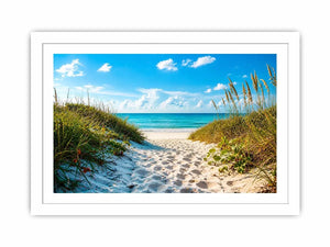 Coastal beach path wall art with sandy dunes leading to blue ocean under clear sky, serene seaside canvas for living room and beach house decor