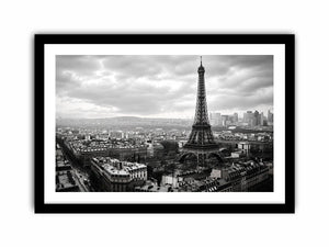 Black and white panoramic view of the Eiffel Tower overlooking the Paris cityscape