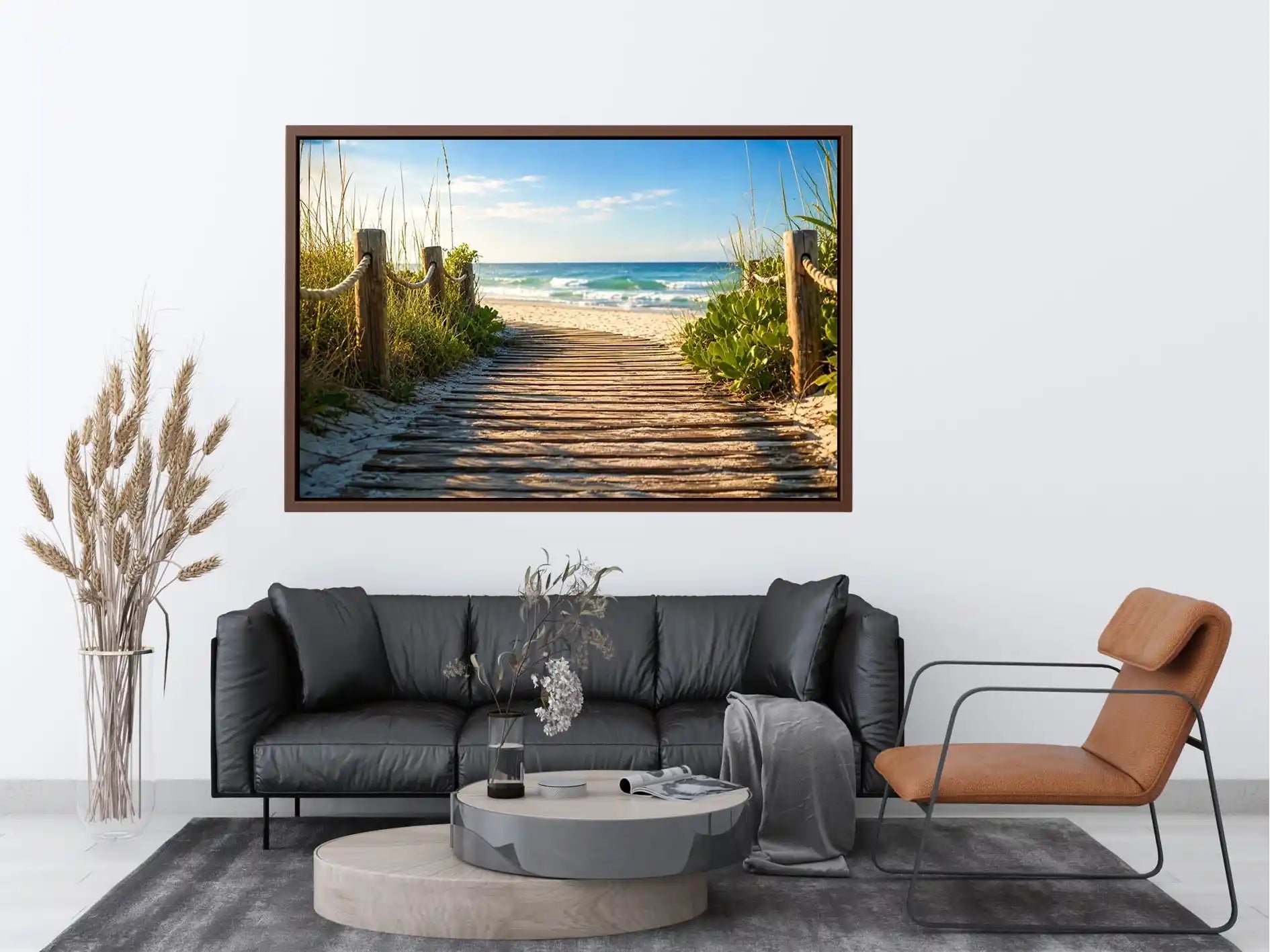 Wooden beach boardwalk leading through coastal dunes toward the ocean shoreline