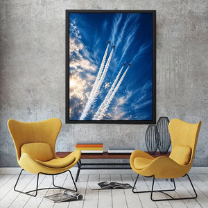 Modern jet formation wall art with airplane contrails against deep blue sky