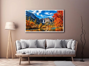 Autumn mountain waterfall landscape with vibrant orange trees and river reflection wall art canvas