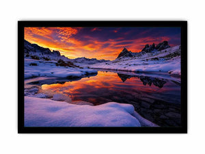 Snowy mountain sunset wall art with frozen lake reflection, colorful twilight sky and peaceful winter landscape photography.