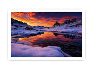 Snowy mountain sunset wall art with frozen lake reflection, colorful twilight sky and peaceful winter landscape photography.