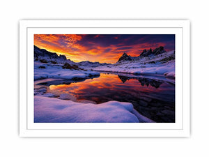 Snowy mountain sunset wall art with frozen lake reflection, colorful twilight sky and peaceful winter landscape photography.